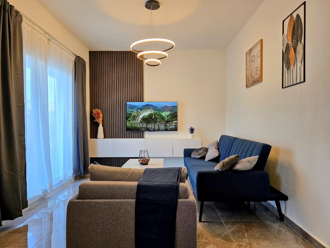 Living area and dining space at Aladia